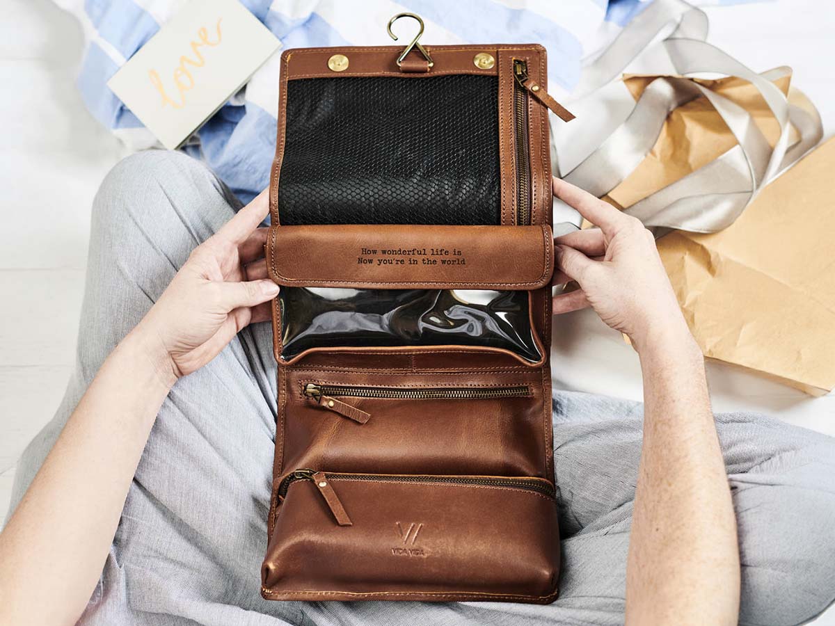 Leather hanging wash bag with secret message thoughtful gift under £100 in the UK